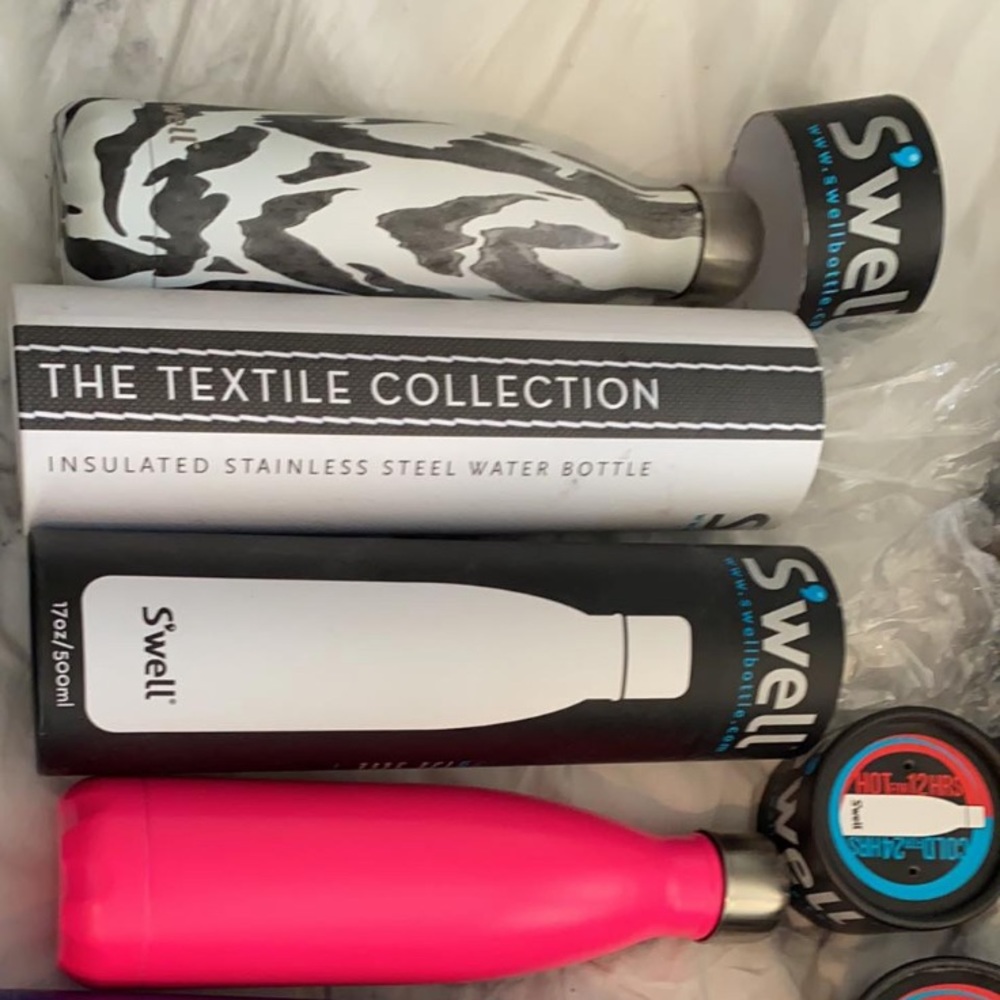 Brand new swell bottles in box, never used